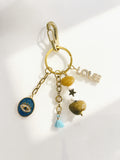 Porte-clés Bijou LOVE - Oeil Protecteur & Pompon - Collection Boho Chic